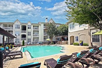 Resort- style swimming pool with sundeck
